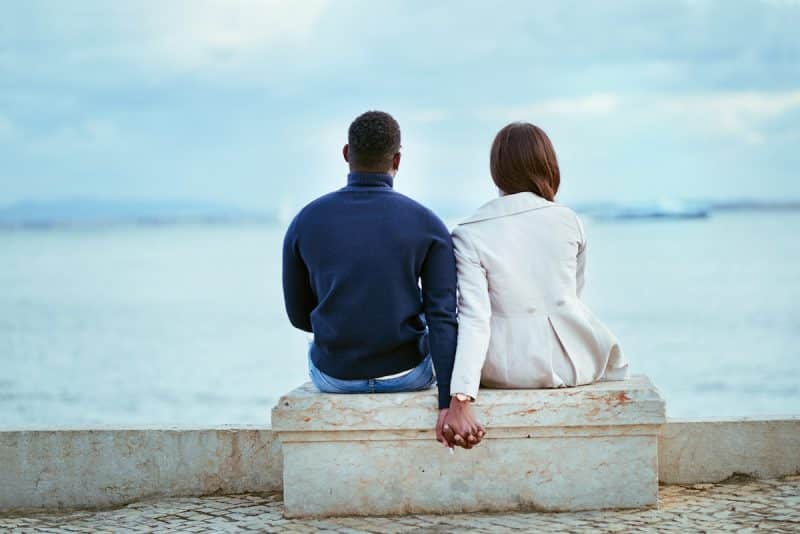 Couple relaxing and holding hands, relationship tips from people with IBD who are single, dating, married