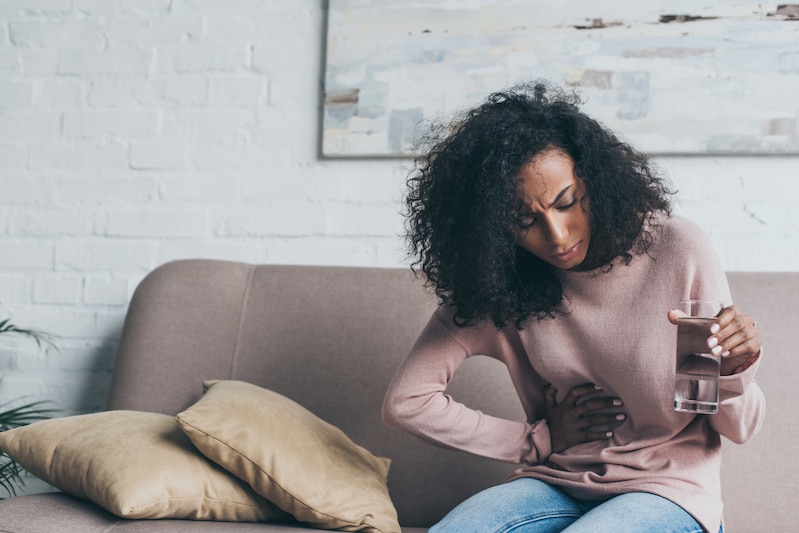 stress affects your body, woman with IBD experiences symptoms